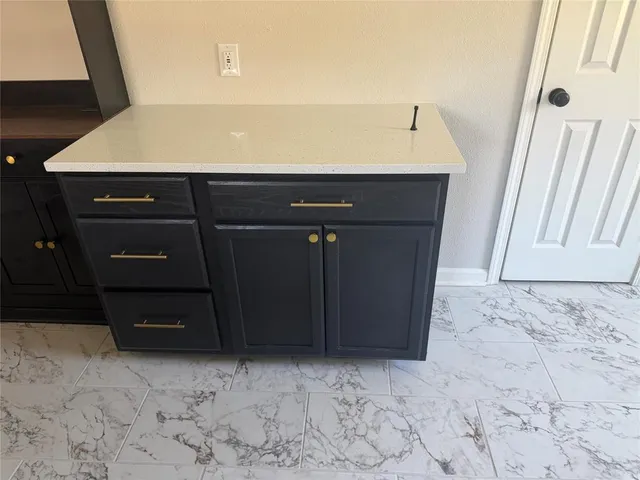 a view of a house with a porch