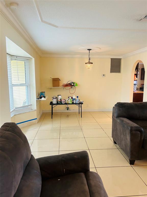 6624 Northwest 1st Court Margate, FL 33063 - Photo 14 of 17 a living room with furniture and a window