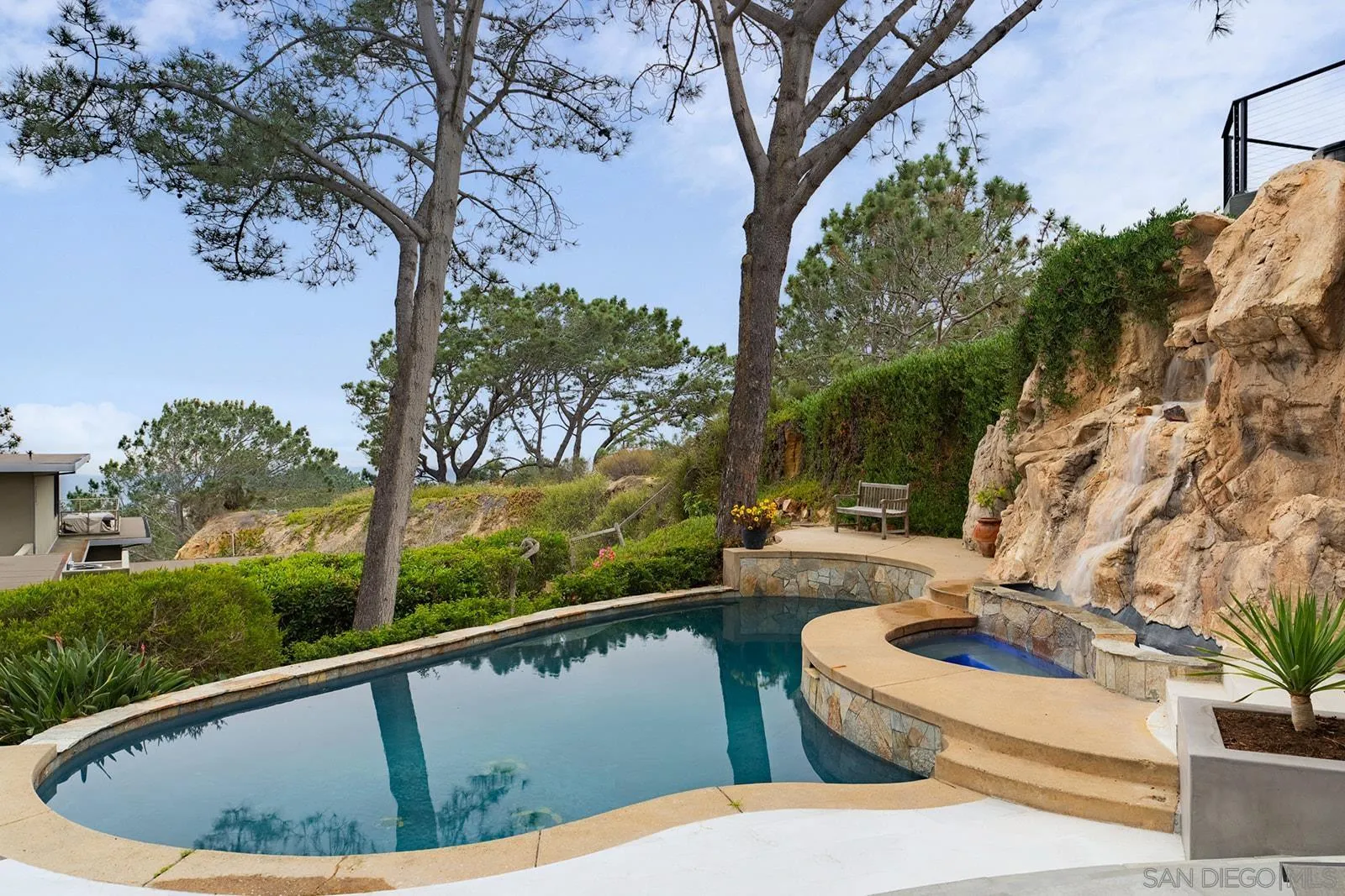 390 Hidden Pines Road Del Mar, CA 92014 - Photo 11 of 46 a view of a swimming pool with a patio and a yard