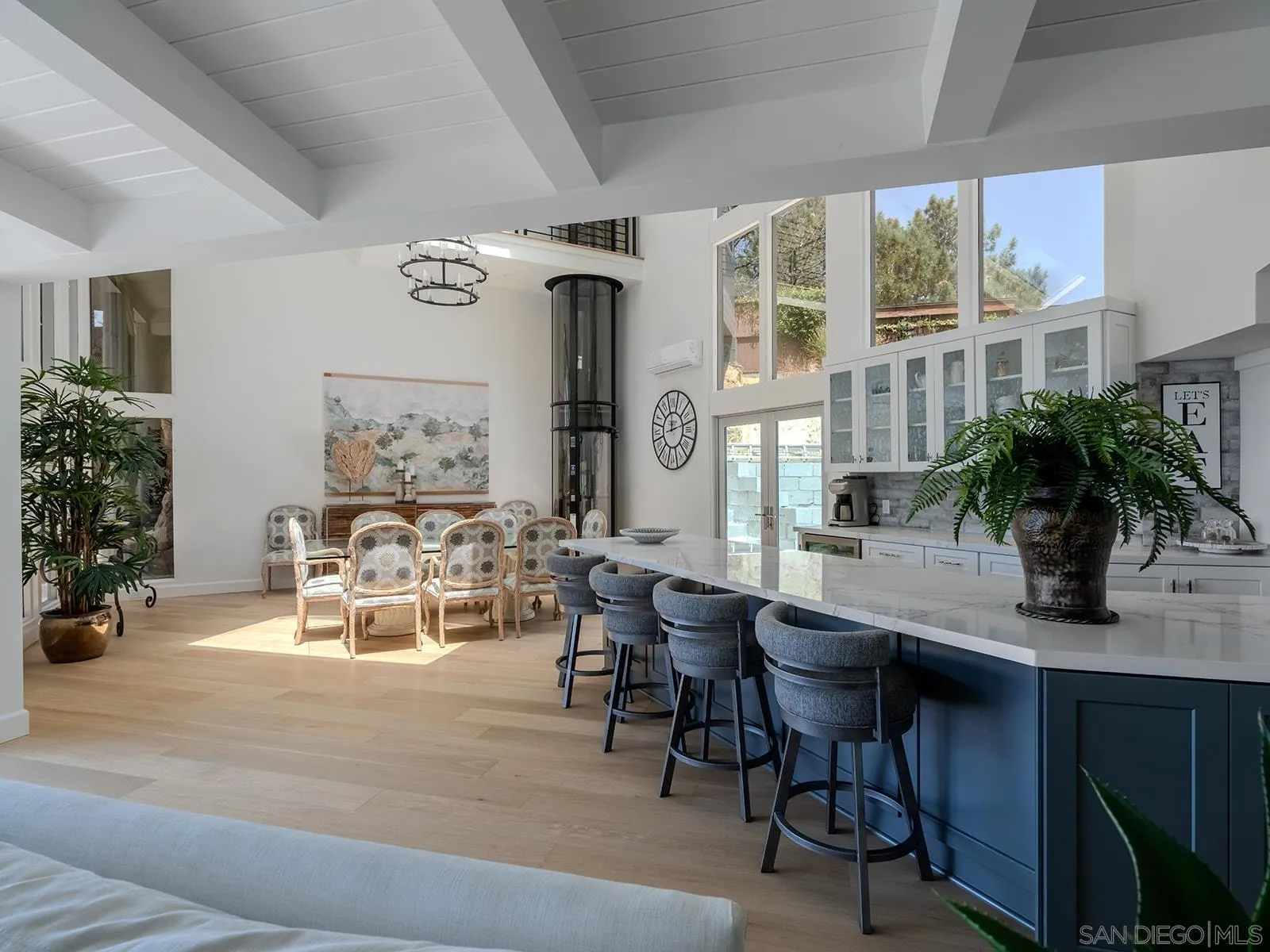 390 Hidden Pines Road Del Mar, CA 92014 - Photo 17 of 46 a view of a dining room with furniture window and outside view