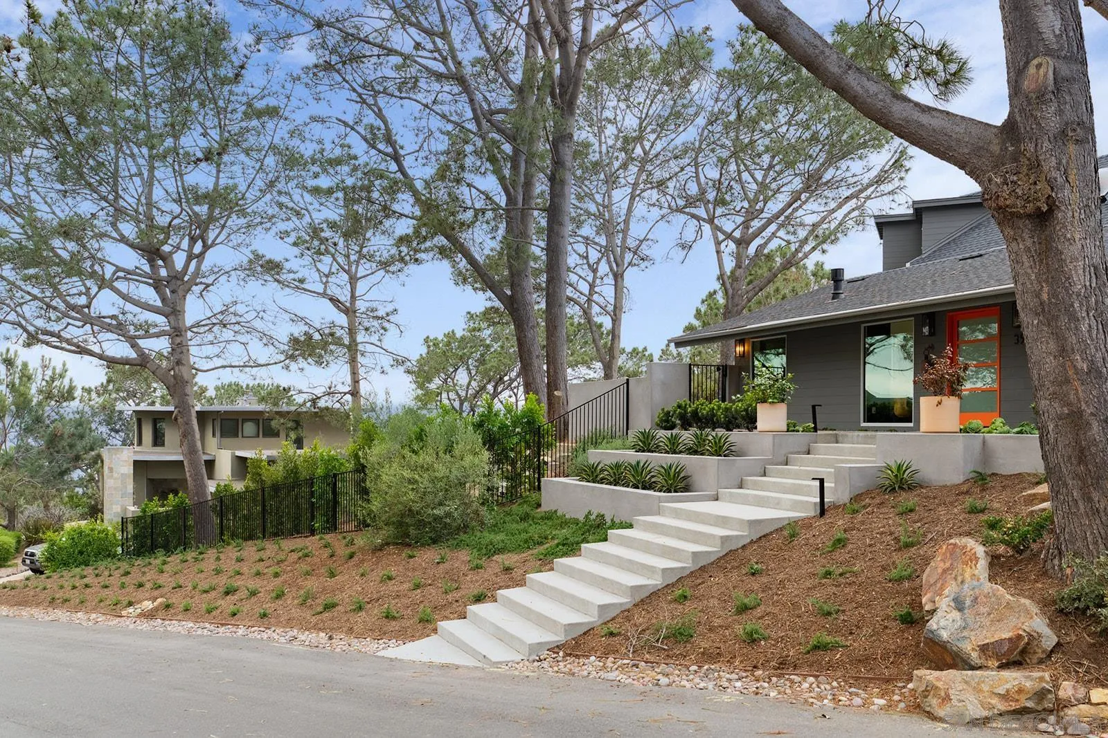 390 Hidden Pines Road Del Mar, CA 92014 - Photo 2 of 46 a view of a house with a patio