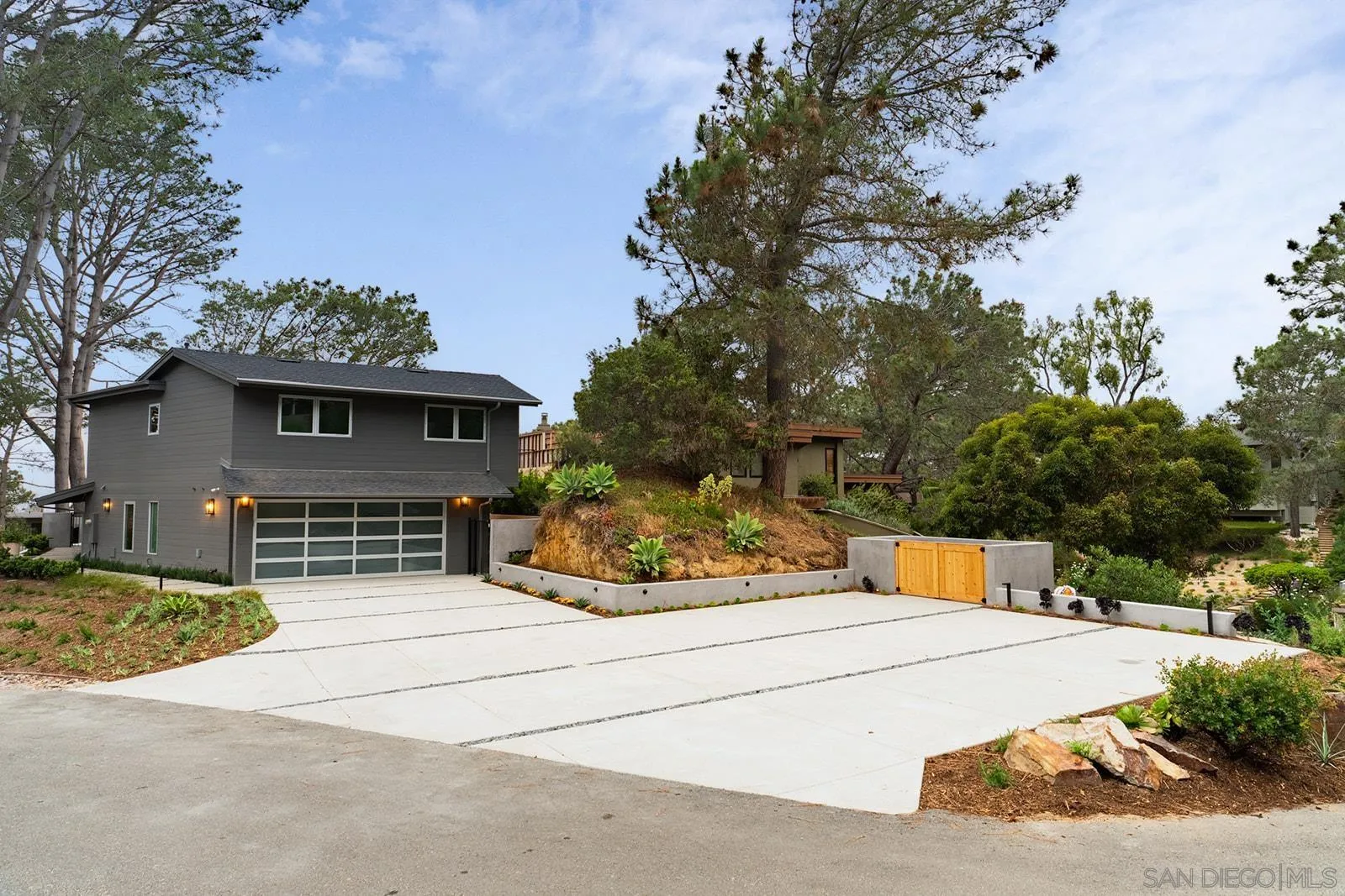 390 Hidden Pines Road Del Mar, CA 92014 - Photo 46 of 46 a view of a house with basketball court