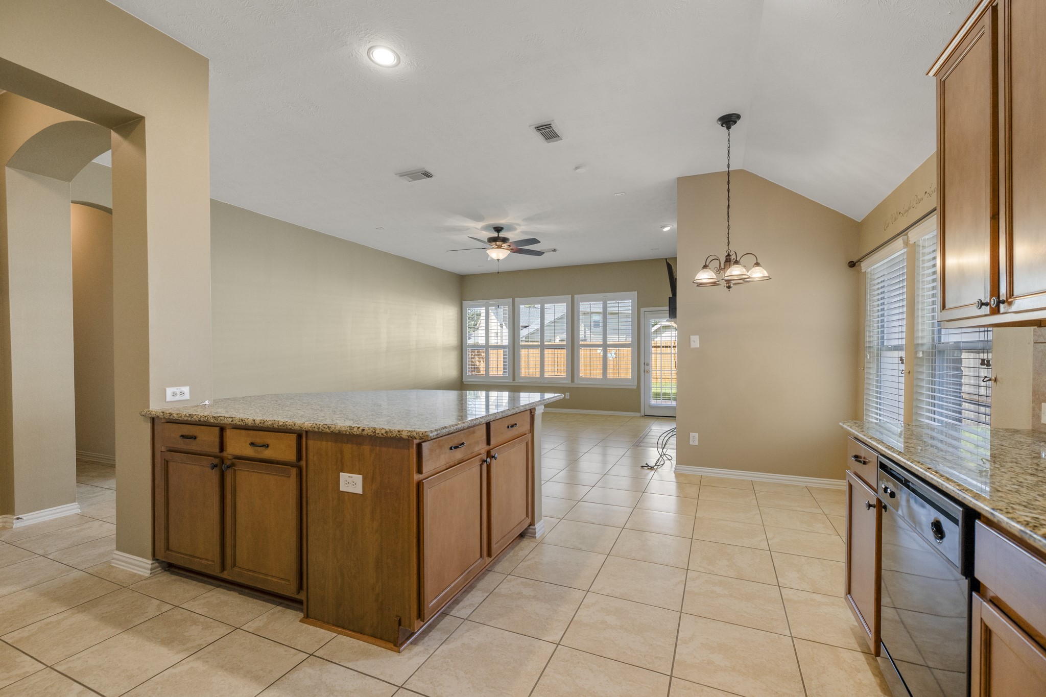 20014 Queens Oak Court Spring, TX 77379 - Photo 16 of 49 a kitchen with stainless steel appliances granite countertop a stove and a sink