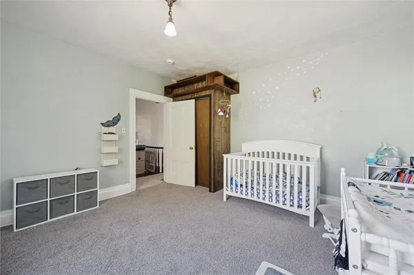 a view of livingroom with furniture and closet