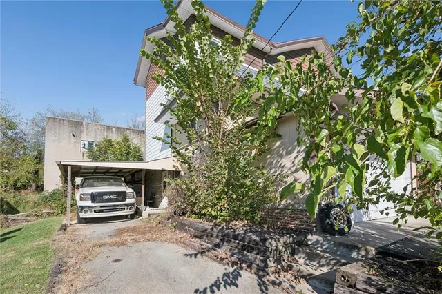 a backyard of a house with lots of green space