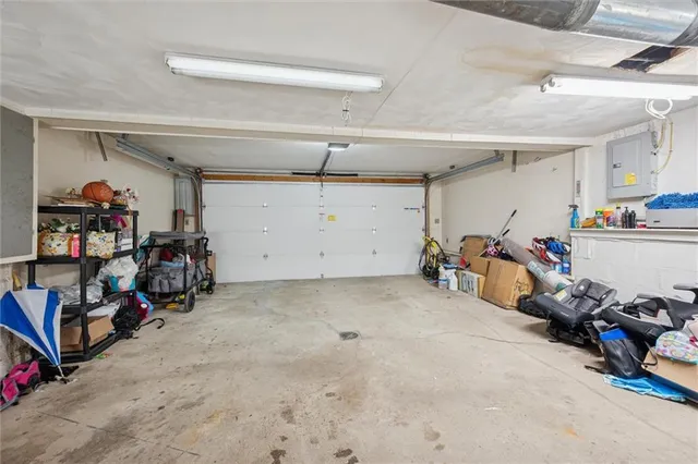 a view of a garage with a bike and storage