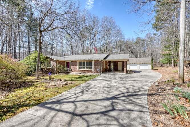 243 Allison Road Blairsville, GA 30512 - Photo 1 of 33 a front view of a house with a yard