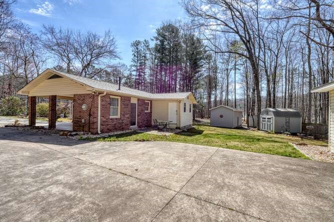 243 Allison Road Blairsville, GA 30512 - Photo 28 of 33 a view of a house with a yard and tree s