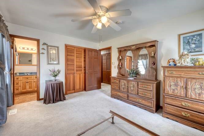 243 Allison Road Blairsville, GA 30512 - Photo 10 of 33 a bedroom with furniture and wooden floor