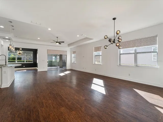 a view of a kitchen with a dishwasher cabinets and a wooden floor