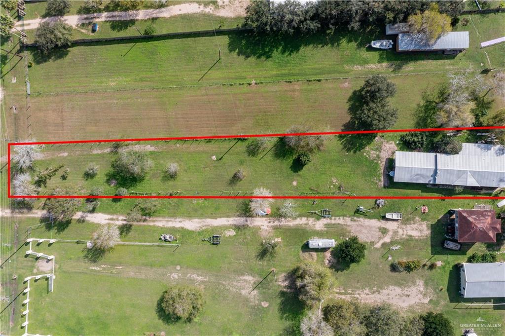 32487 Farm To Market Road 2925 Rio Hondo, TX 78583 - Photo 3 of 7 an aerial view of lake houses with outdoor space