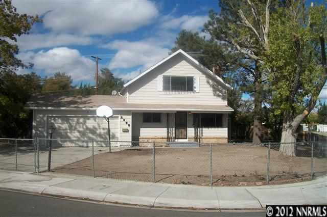 2295 Mannington Street Reno, NV 89512 - Photo 1 of 1 a front view of a house with garage