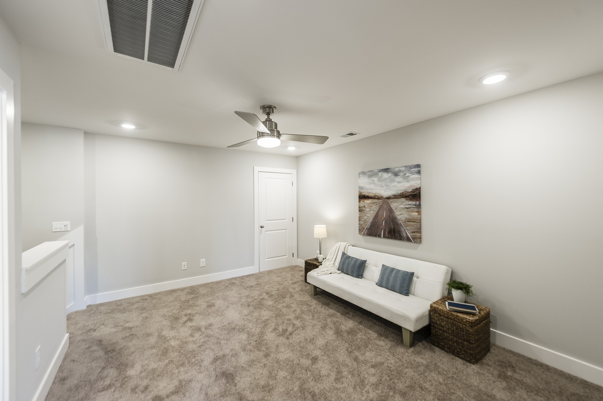 1144 Lock 4 Road, Unit B2 Gallatin, TN 37066 - Photo 14 of 17 a living room with a couch and a ceiling fan