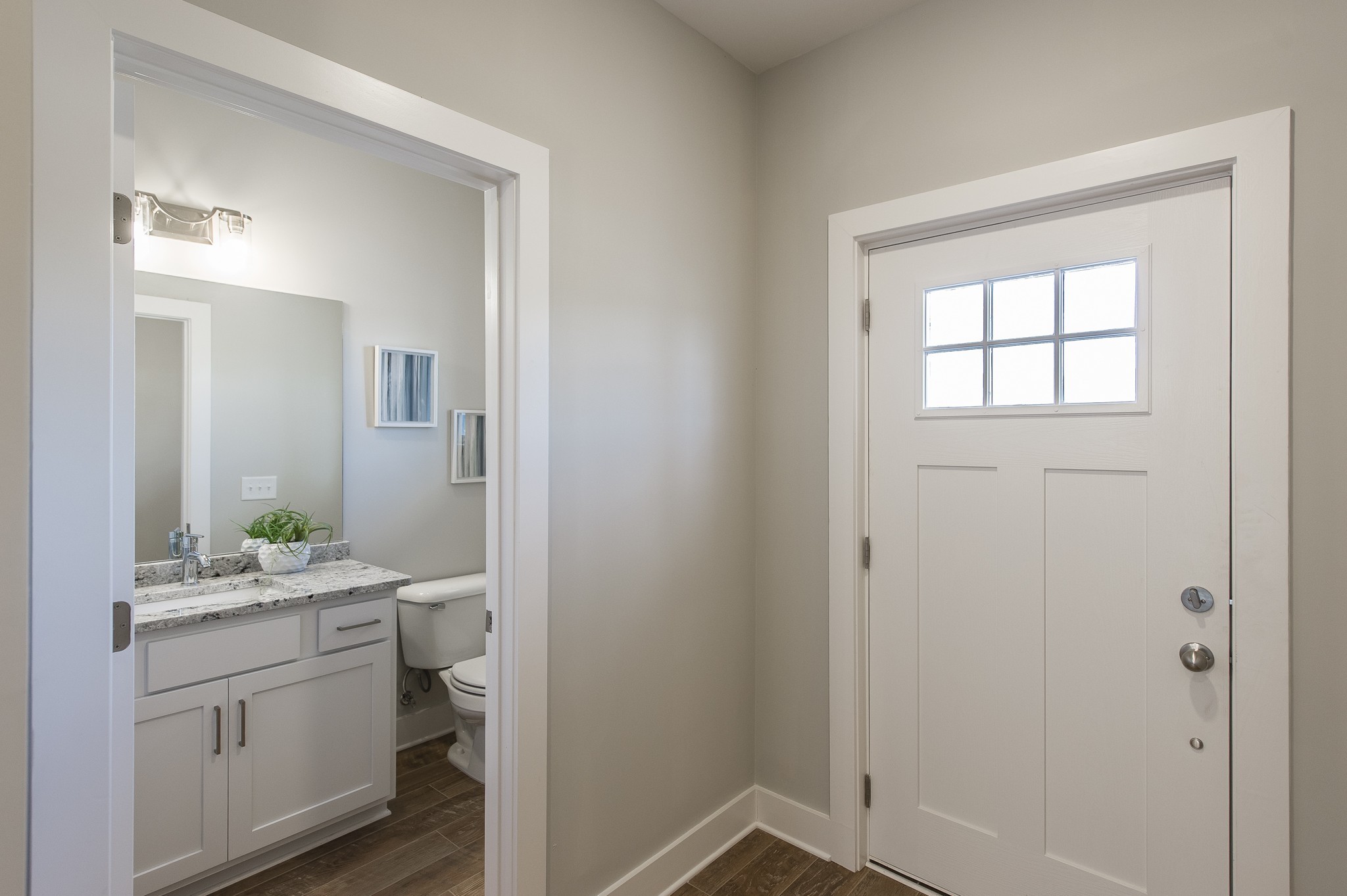 1144 Lock 4 Road, Unit B2 Gallatin, TN 37066 - Photo 4 of 17 a bathroom with a granite countertop sink and a mirror