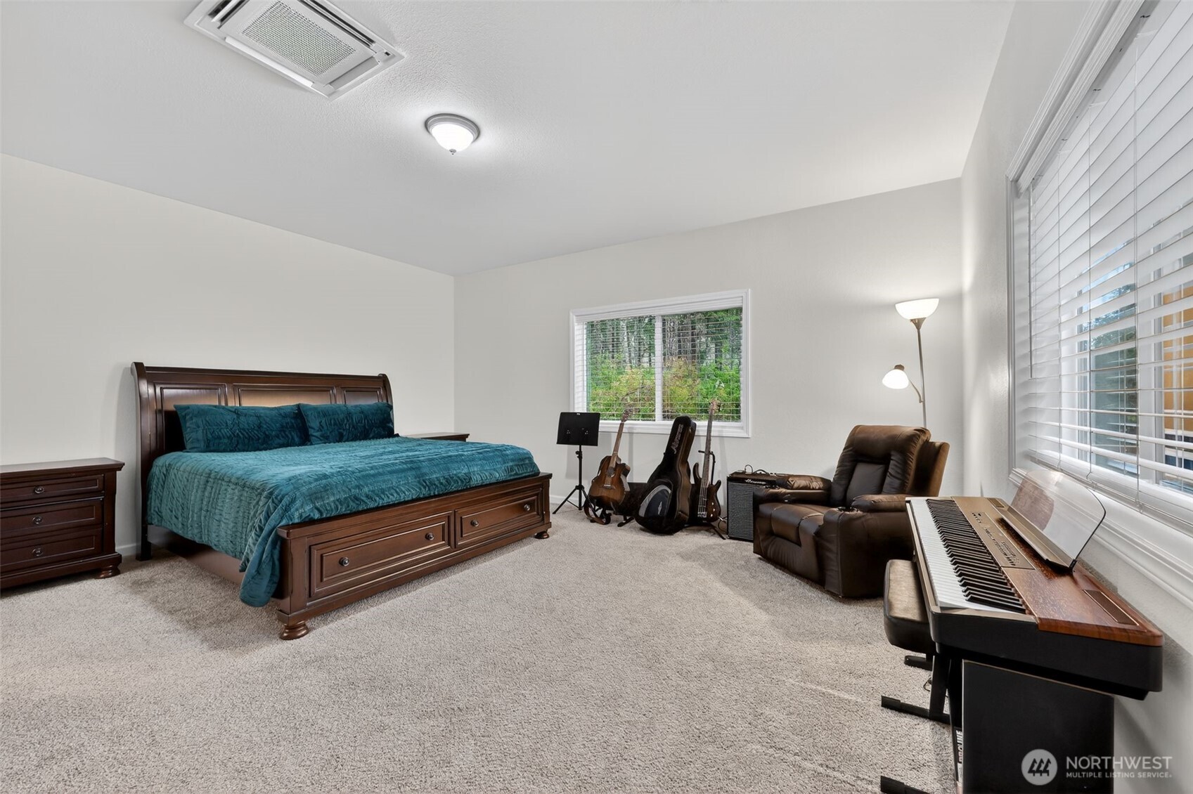 148 East Fox Run Lane Grapeview, WA 98546 - Photo 14 of 32 a bedroom with a bed and a couch