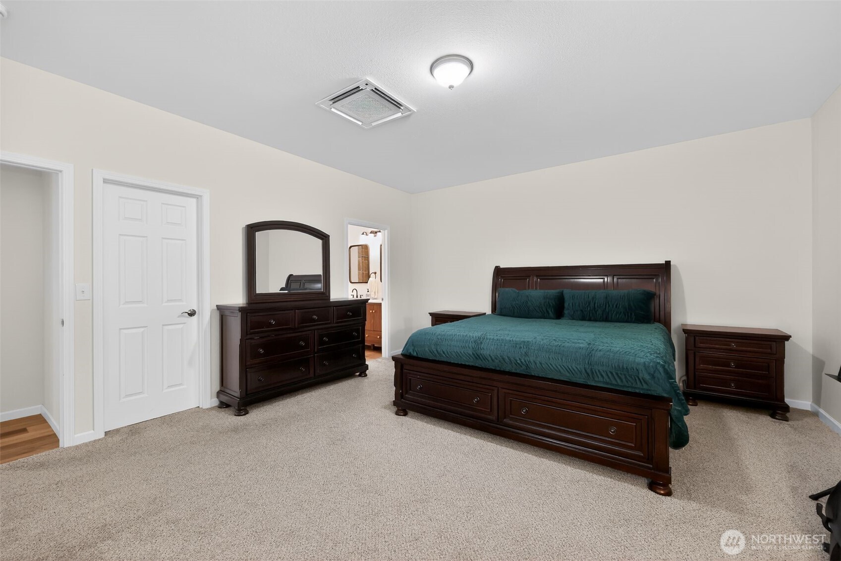 148 East Fox Run Lane Grapeview, WA 98546 - Photo 15 of 32 a bedroom with a bed and a dresser