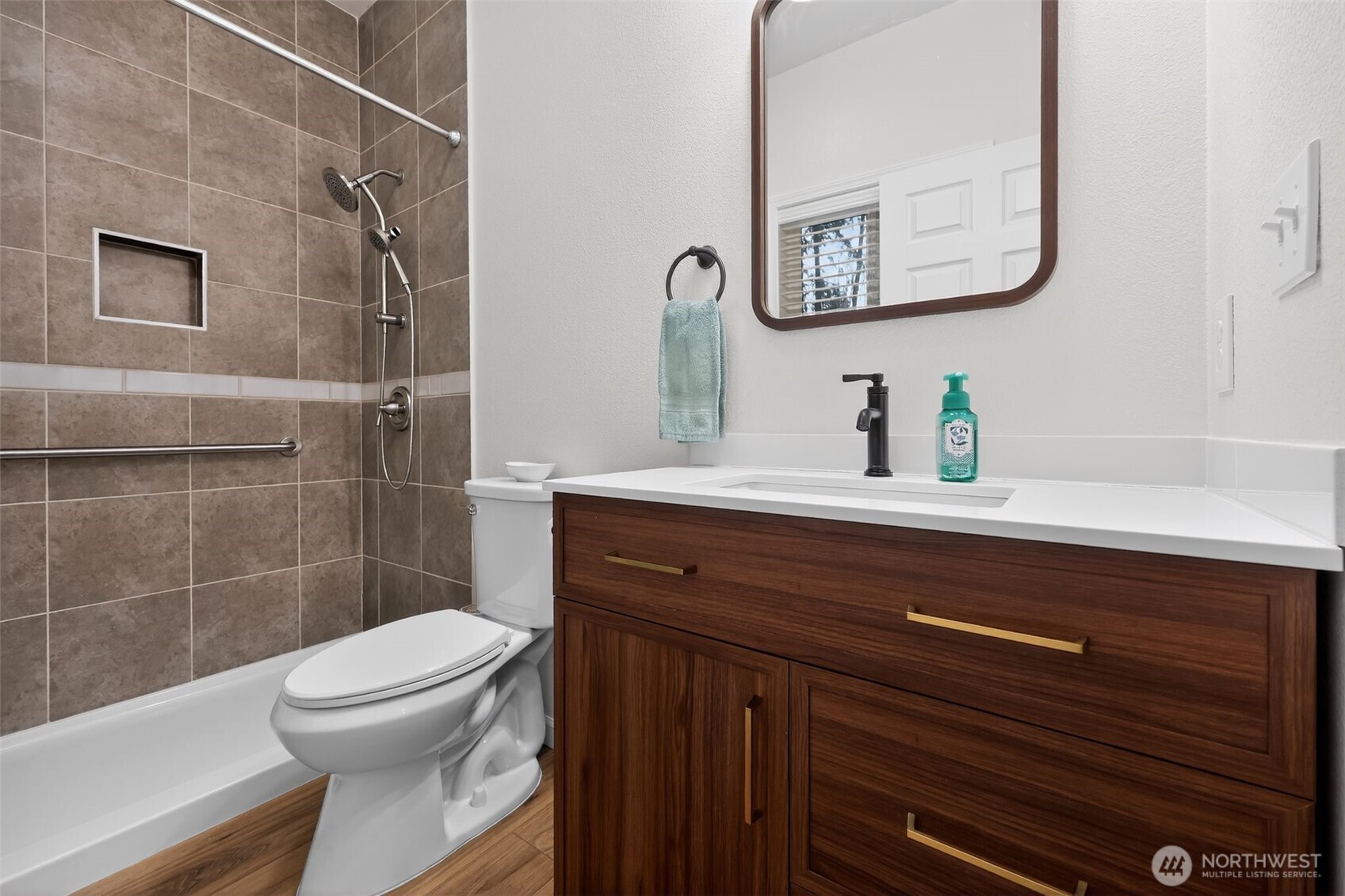 148 East Fox Run Lane Grapeview, WA 98546 - Photo 22 of 32 a bathroom with a sink a toilet and shower