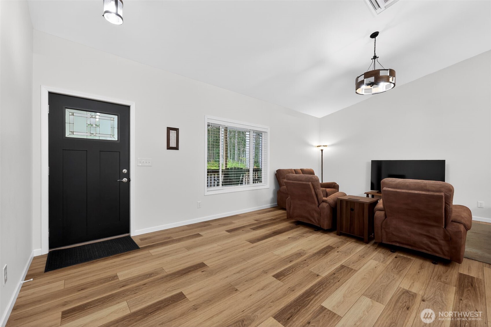 148 East Fox Run Lane Grapeview, WA 98546 - Photo 3 of 32 a living room with furniture and a window