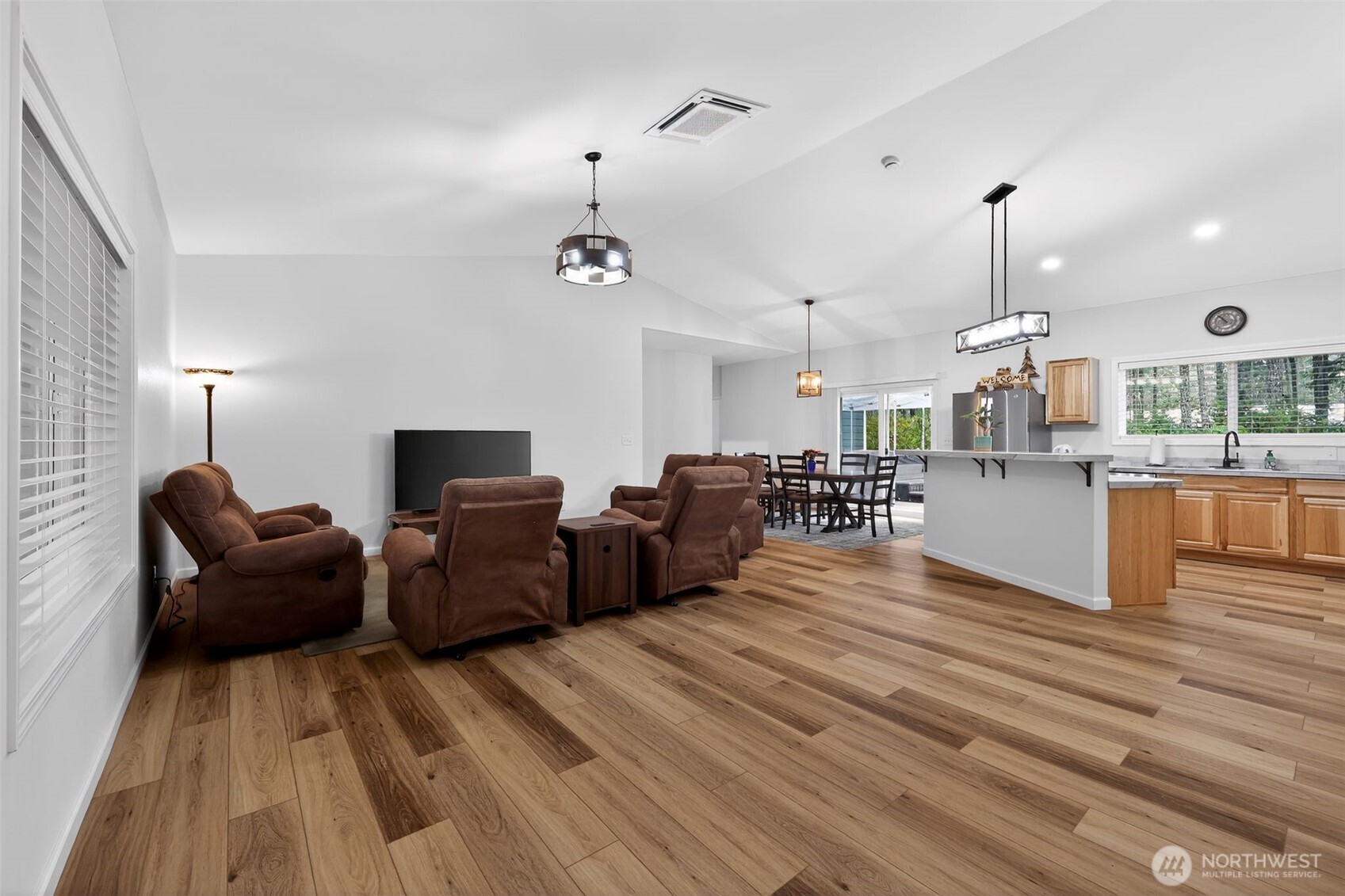 148 East Fox Run Lane Grapeview, WA 98546 - Photo 4 of 32 a living room with furniture and a wooden floor