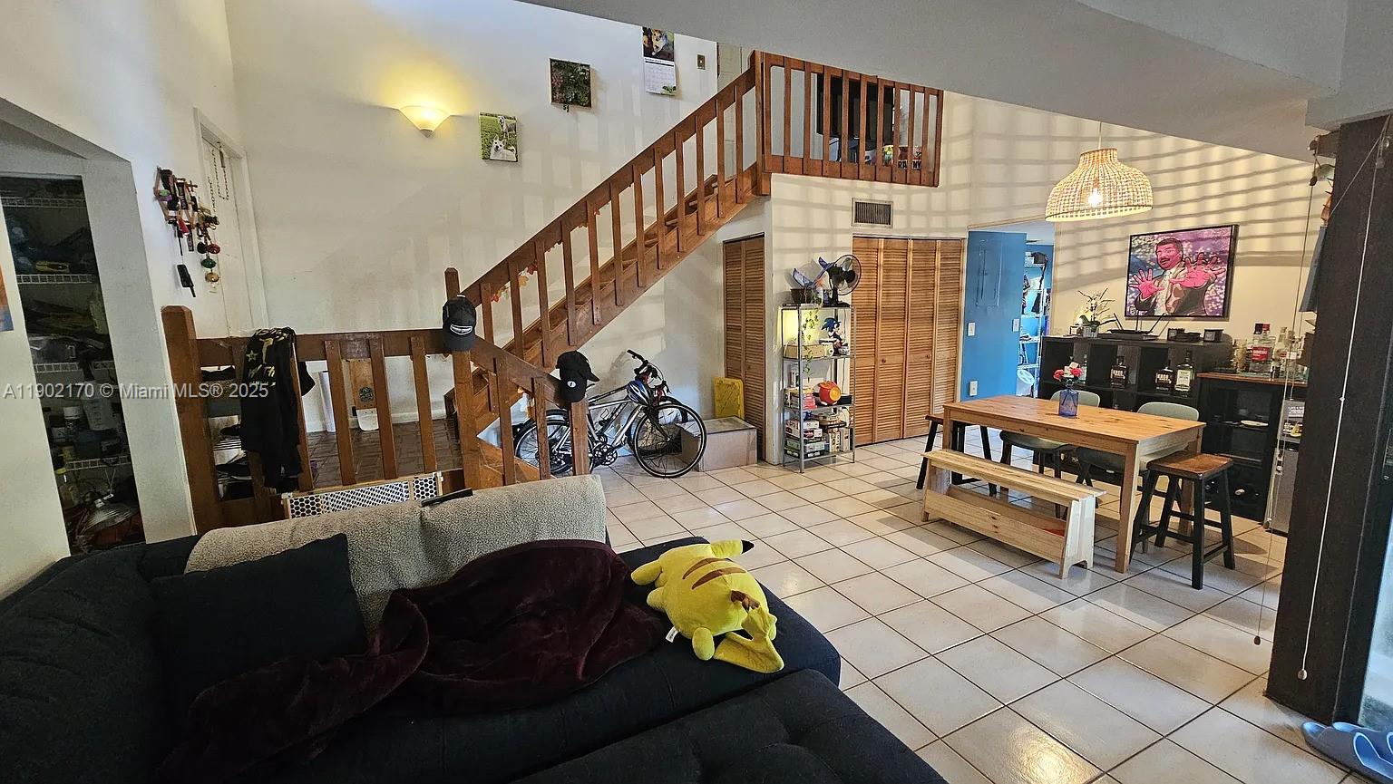 13235 Southwest 110th Terrace, Unit 183 Miami, FL 33186 - Photo 1 of 14 a living room with furniture