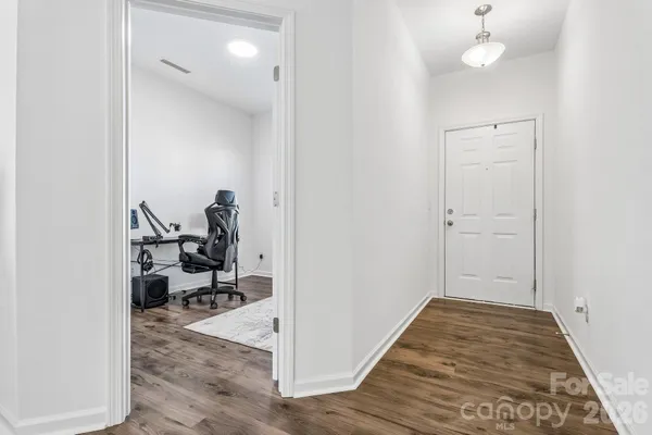 a view of a livingroom and hardwood floor