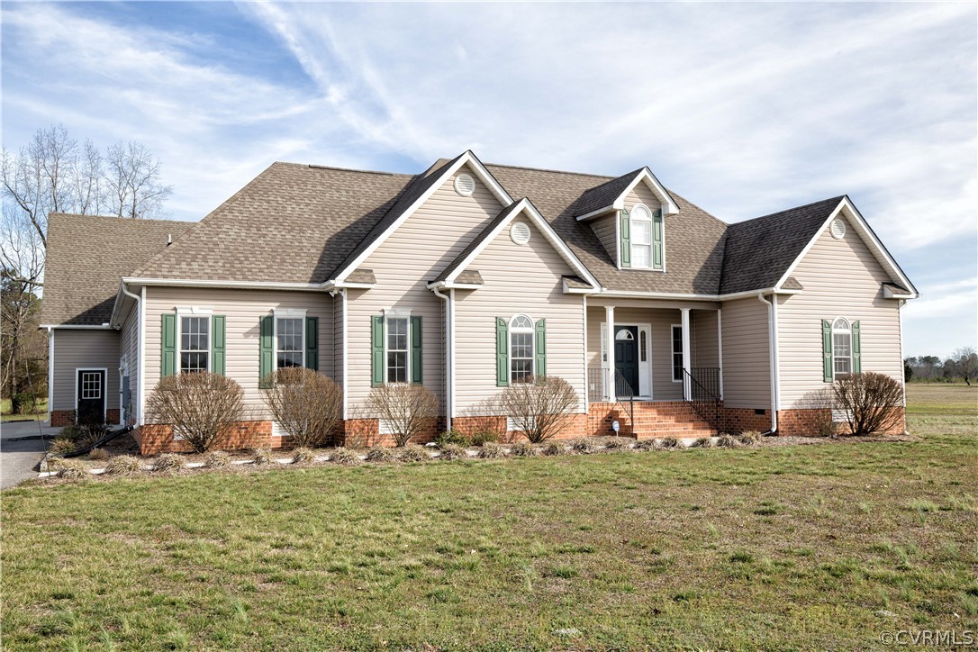 16840 Loving Union Road Disputanta, VA 23842 - Photo 1 of 35 a front view of house with yard