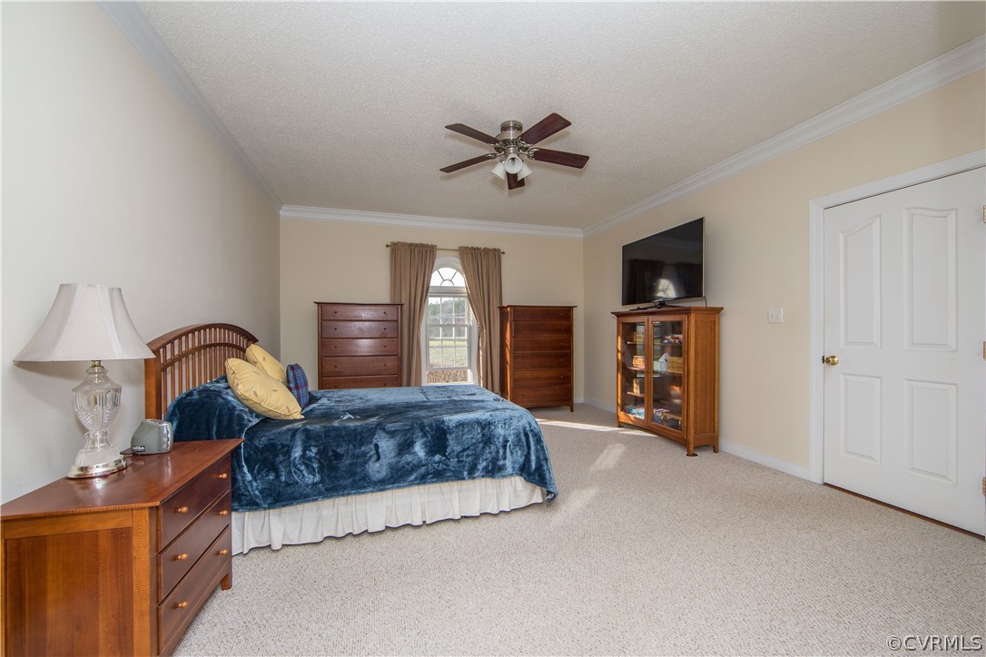 16840 Loving Union Road Disputanta, VA 23842 - Photo 13 of 35 a living room with furniture and a flat screen tv