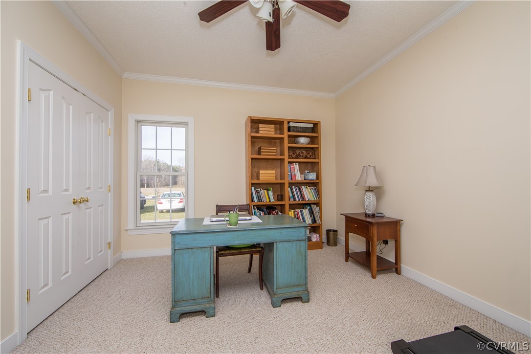 16840 Loving Union Road Disputanta, VA 23842 - Photo 20 of 35 a view of a workspace with furniture and a window