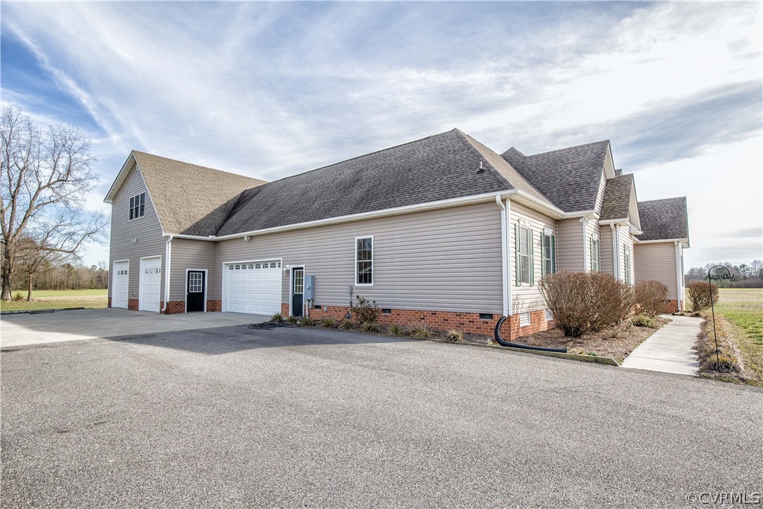 16840 Loving Union Road Disputanta, VA 23842 - Photo 2 of 35 a view of a house with a patio