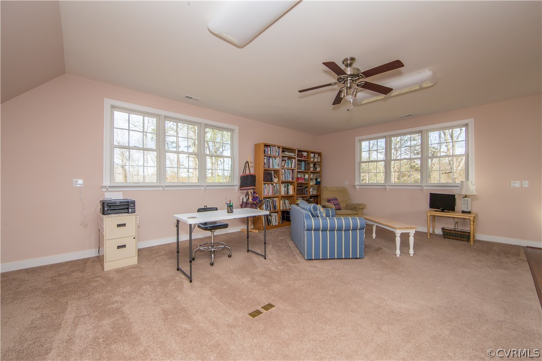 16840 Loving Union Road Disputanta, VA 23842 - Photo 24 of 35 a living room with furniture and windows