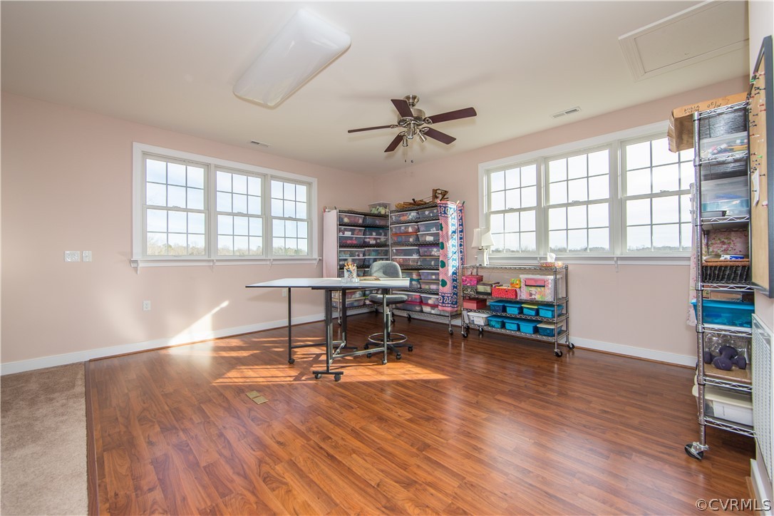 16840 Loving Union Road Disputanta, VA 23842 - Photo 25 of 35 a living room with furniture and a wooden floor