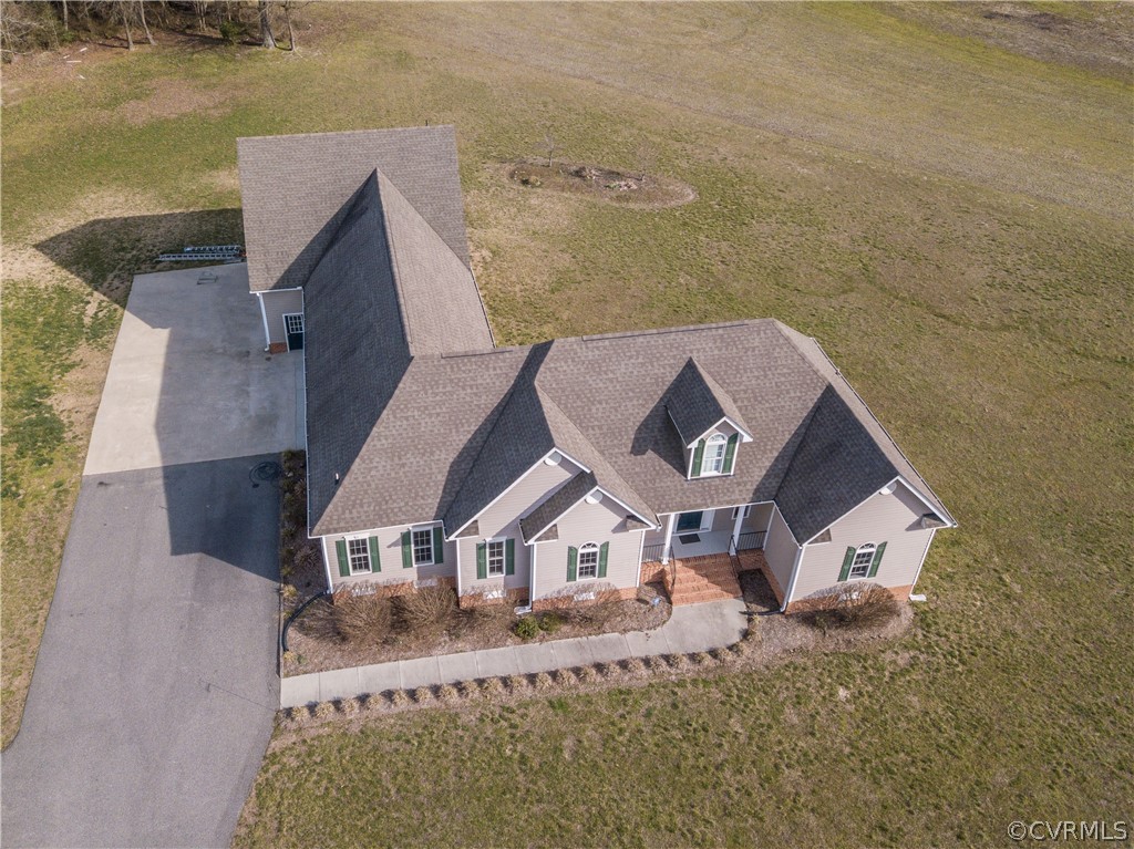 16840 Loving Union Road Disputanta, VA 23842 - Photo 30 of 35 a front view of a house with a yard