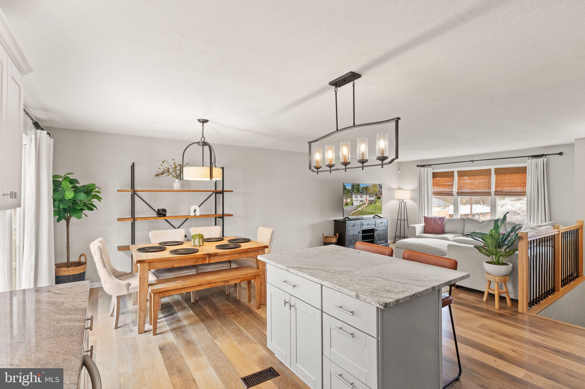 413 George Street Winchester, VA 22601 - Photo 14 of 54 a view of a dining room with furniture window and wooden floor