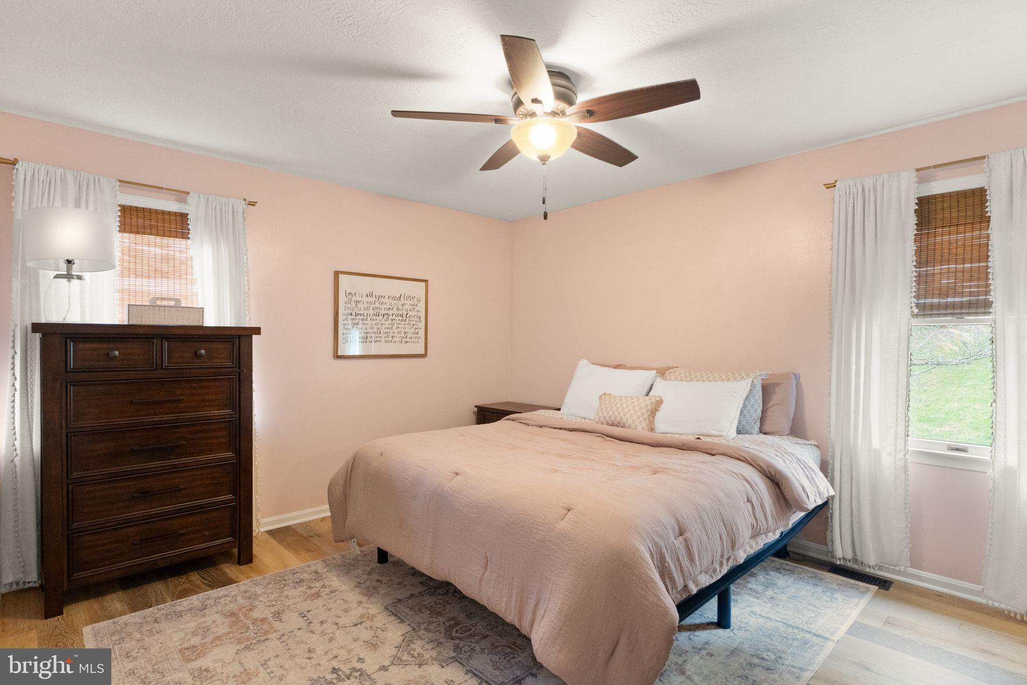 413 George Street Winchester, VA 22601 - Photo 19 of 54 a bedroom with a bed and a dresser
