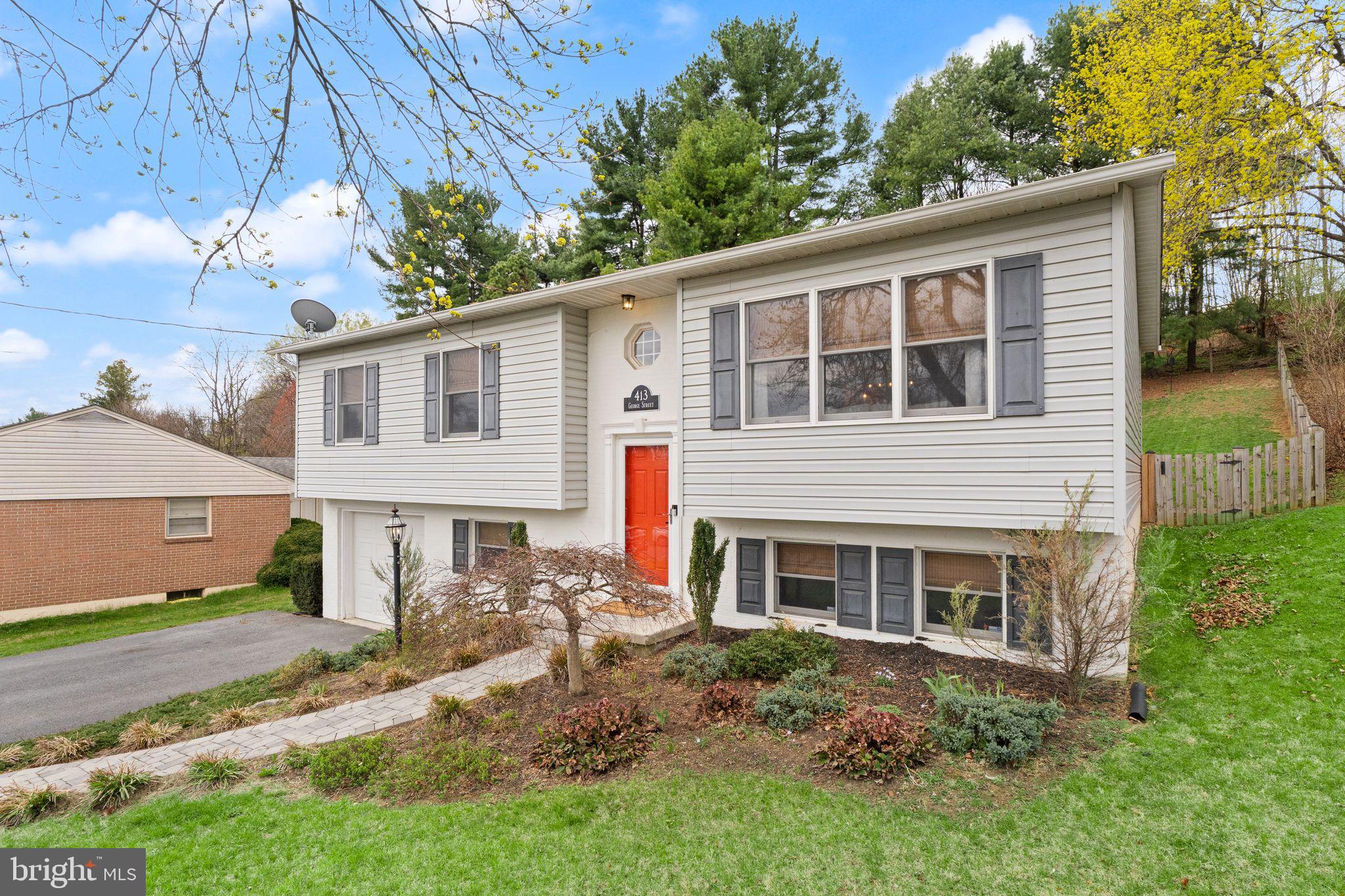 413 George Street Winchester, VA 22601 - Photo 2 of 54 front view of a house with a yard