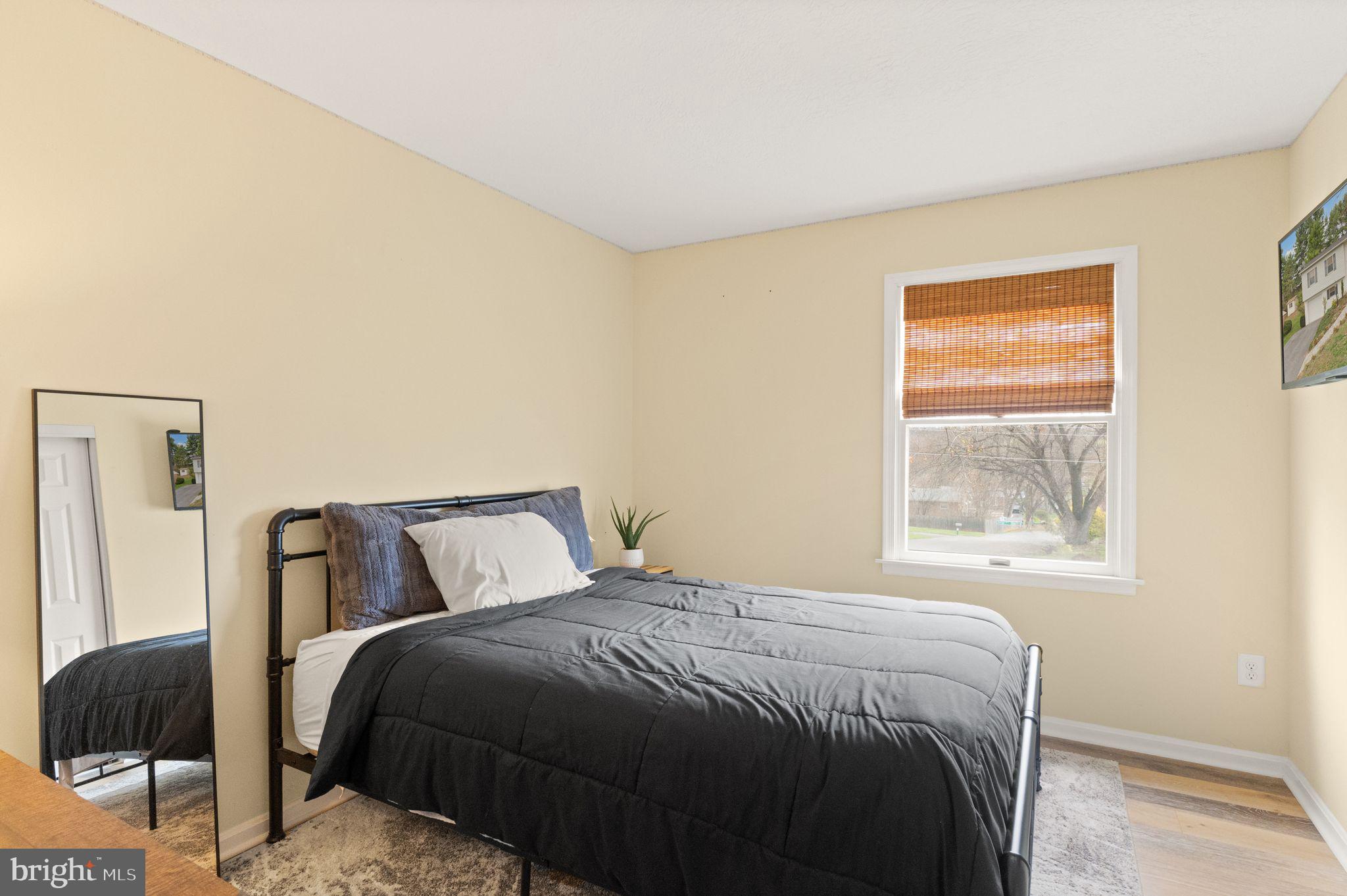 413 George Street Winchester, VA 22601 - Photo 26 of 54 a bedroom with a bed and window