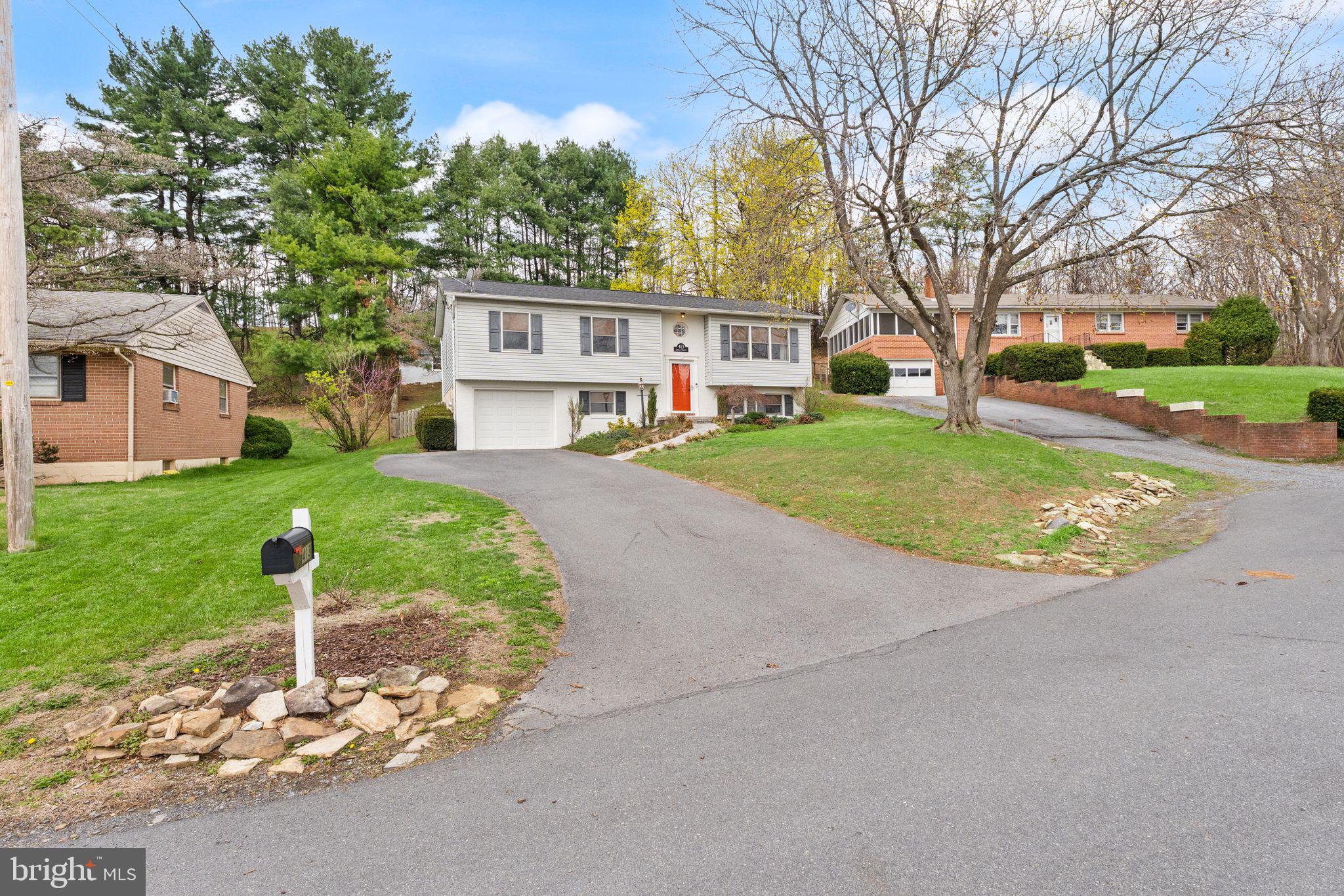 413 George Street Winchester, VA 22601 - Photo 4 of 54 front view of a house with a yard
