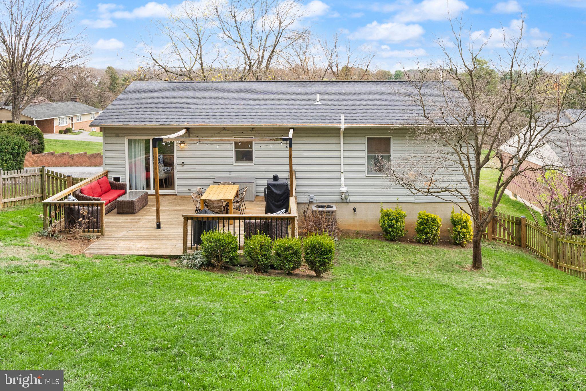 413 George Street Winchester, VA 22601 - Photo 50 of 54 a front view of a house with garden