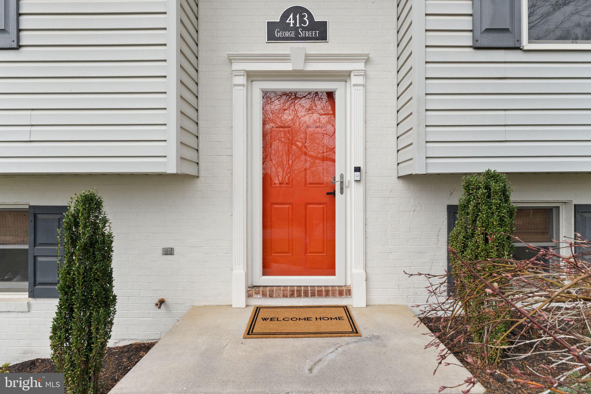 413 George Street Winchester, VA 22601 - Photo 6 of 54 a view of front door with potted plants