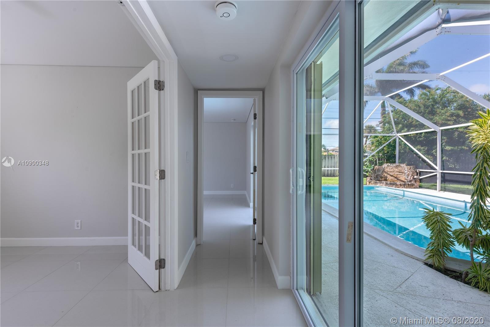 2630 Northeast 51st Court Lighthouse Point, FL 33064 - Photo 25 of 43 a view of entryway with livingroom
