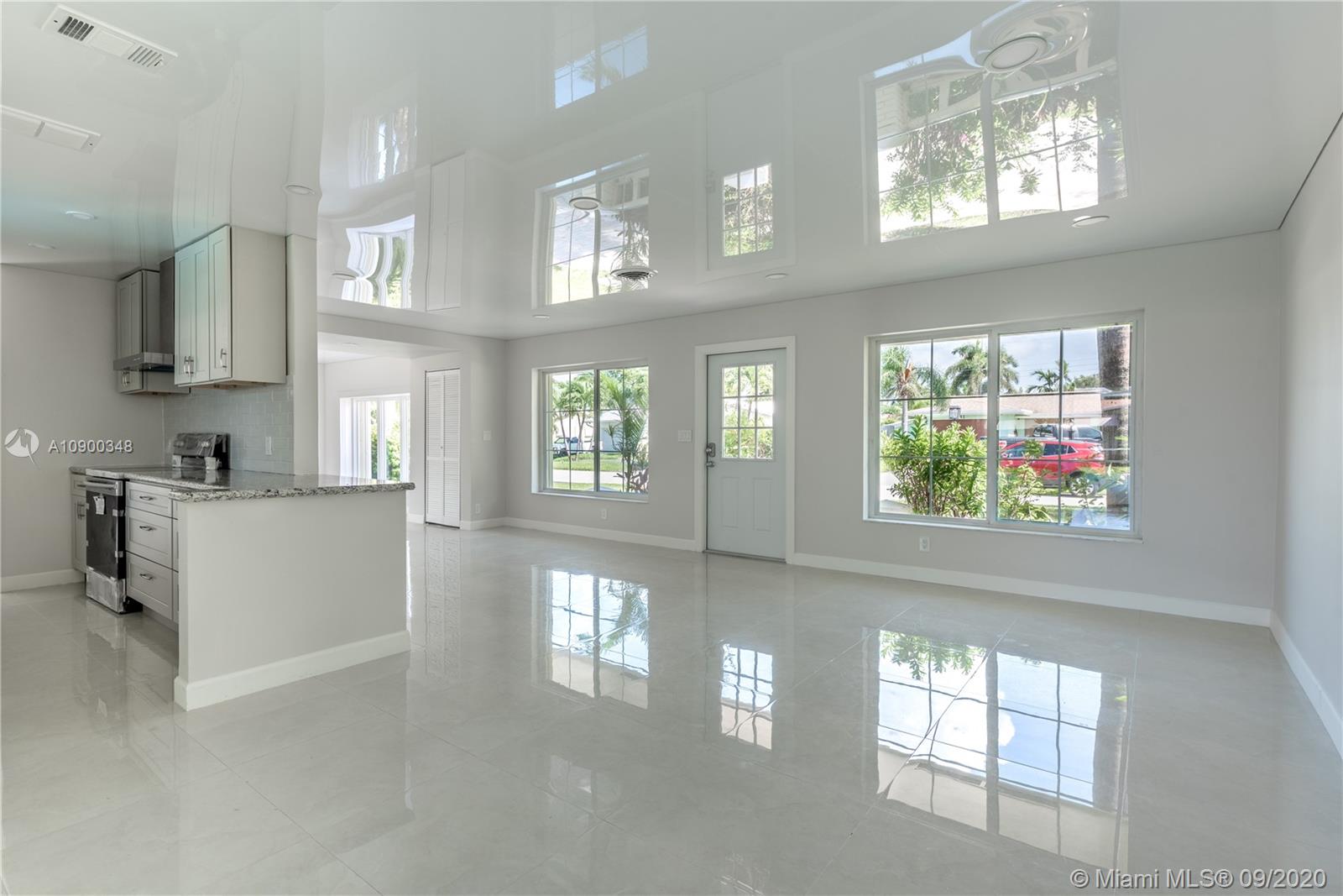 2630 Northeast 51st Court Lighthouse Point, FL 33064 - Photo 9 of 43 a view of kitchen and windows