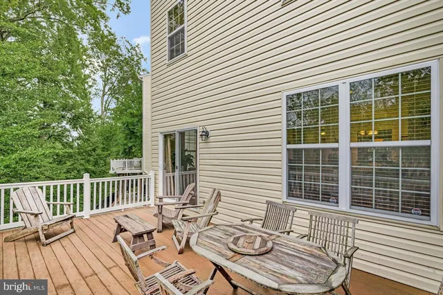 a view of a deck with furniture