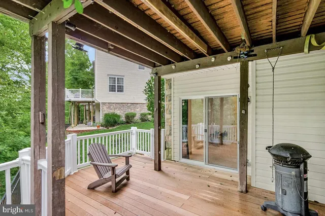 a view of a balcony with chair
