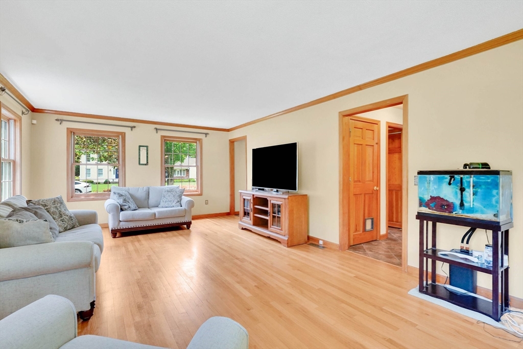5 Evergreen Circle Wilbraham, MA 01095 - Photo 17 of 39 a living room with furniture and a flat screen tv