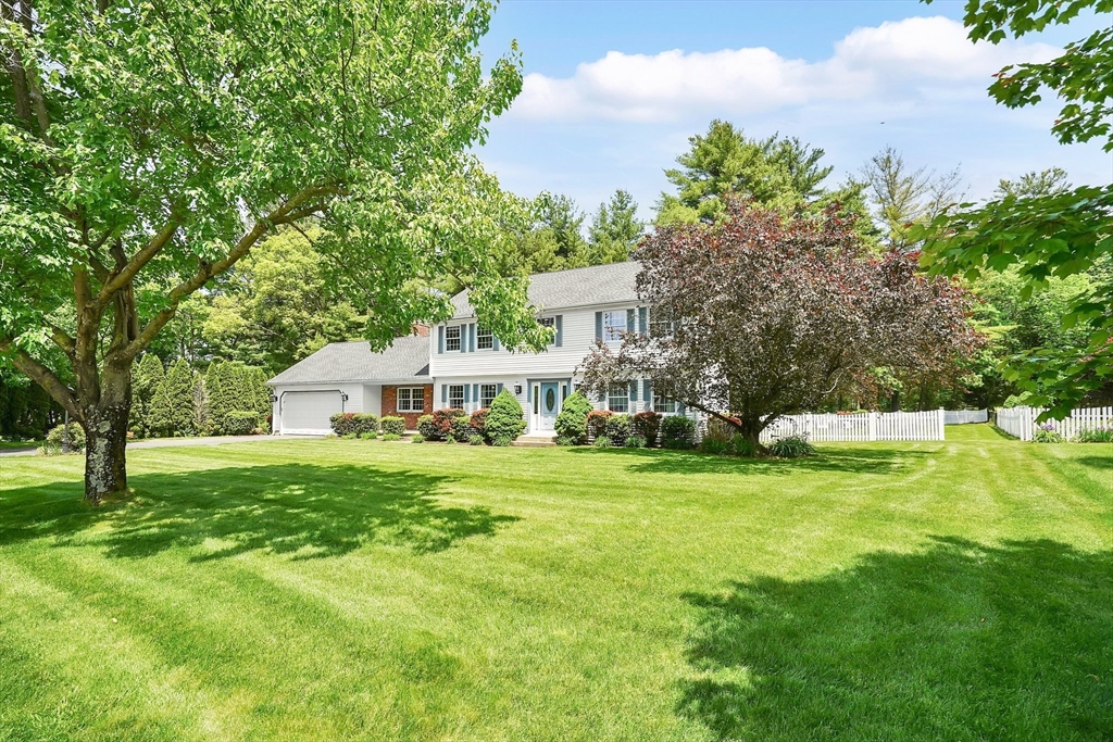 5 Evergreen Circle Wilbraham, MA 01095 - Photo 2 of 39 a front view of a house with a yard