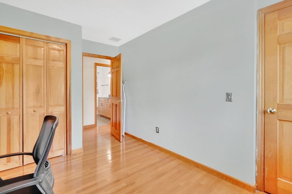 5 Evergreen Circle Wilbraham, MA 01095 - Photo 24 of 39 a view of a room with wooden floor and a window