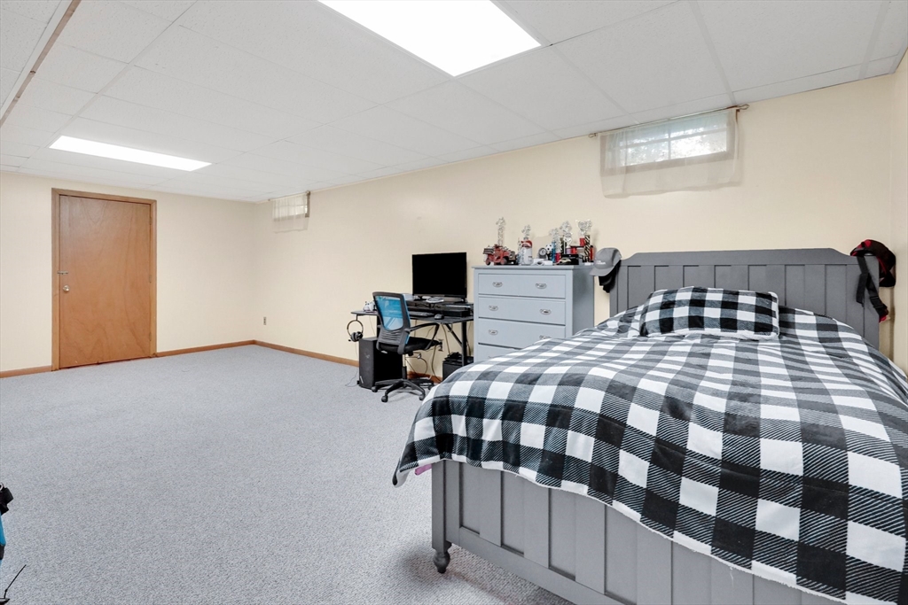 5 Evergreen Circle Wilbraham, MA 01095 - Photo 29 of 39 a bedroom with a bed and a window