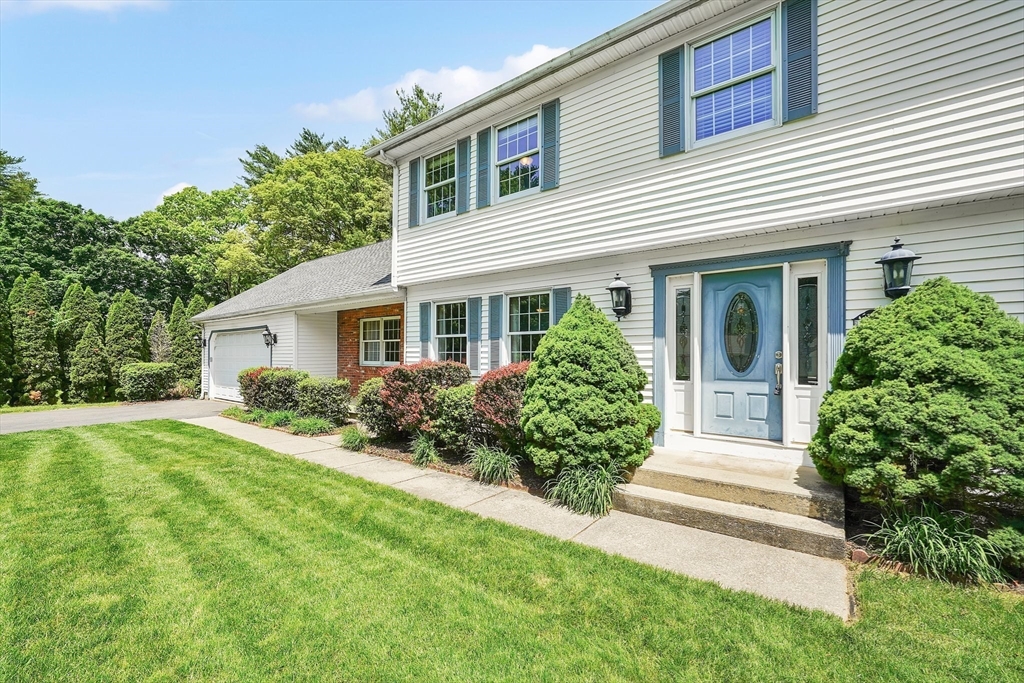 5 Evergreen Circle Wilbraham, MA 01095 - Photo 34 of 39 a front view of a house with a yard