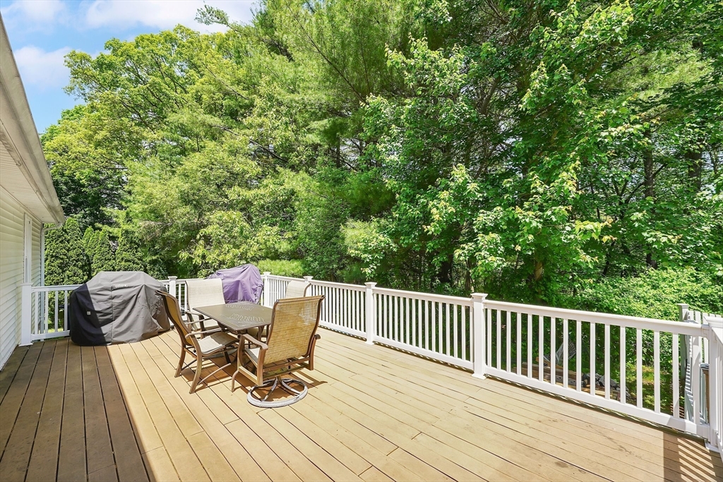 5 Evergreen Circle Wilbraham, MA 01095 - Photo 35 of 39 a view of a deck with furniture and wooden floor