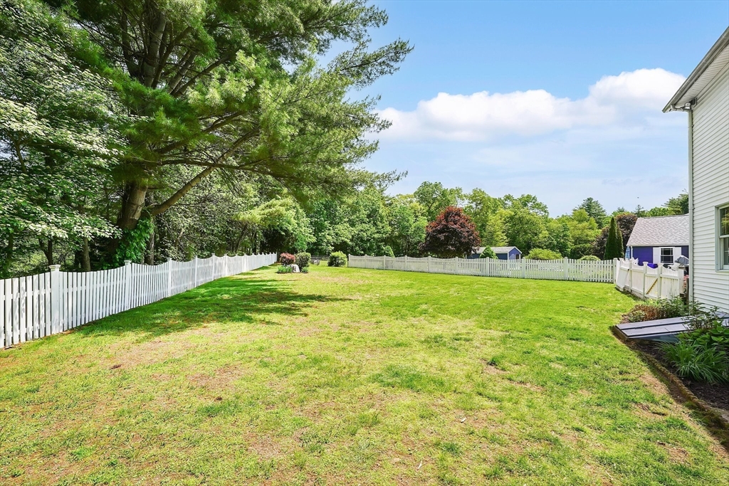 5 Evergreen Circle Wilbraham, MA 01095 - Photo 37 of 39 a view of a garden with a fountain